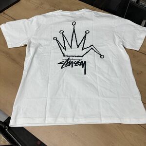 Stussy White Short Sleeve Tee with Black Crown Graphic